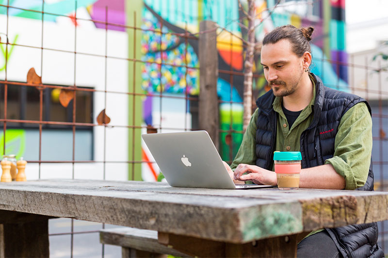 Man studying outside